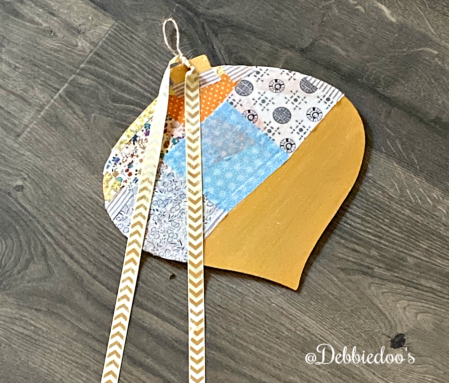 Dollar Tree Christmas wood cutout makeover with paint, mod podge and fabric