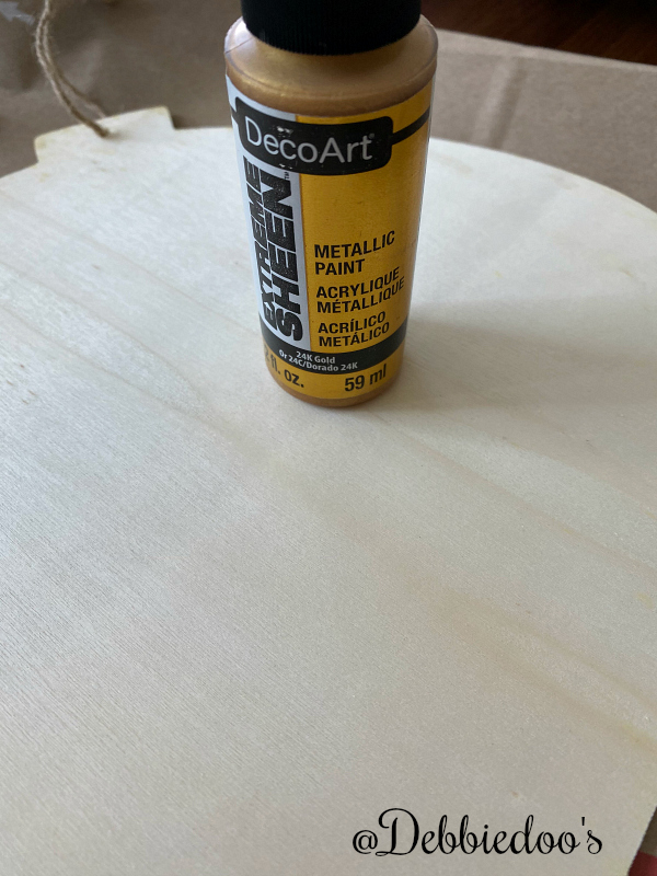 Dollar Tree Christmas wood cutout makeover with paint, mod podge and fabric