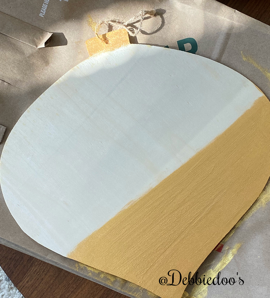Dollar Tree Christmas wood cutout makeover with paint, mod podge and fabric