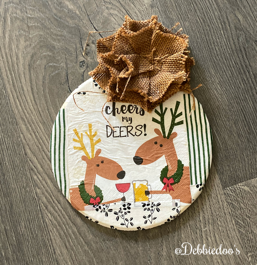 DIY Christmas sign with napkins and mod podge