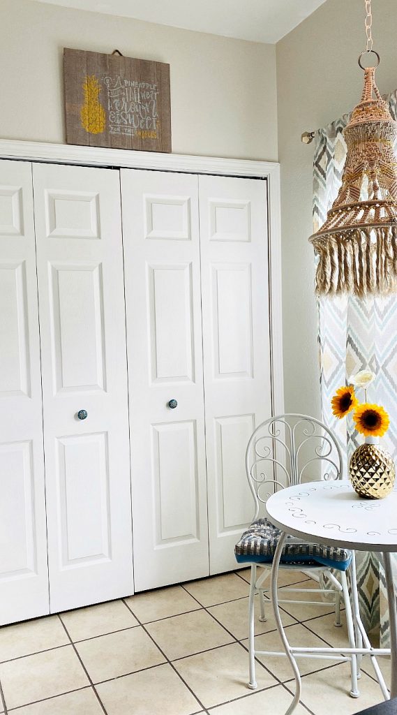 Bohemian style kitchen and pineapple sign