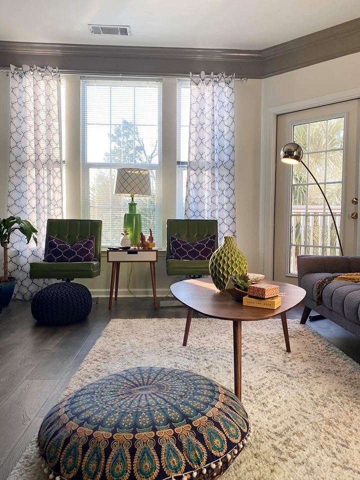 Boho living room with a mix of Mid century modern